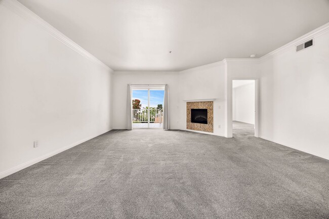 Building Photo - Gorgeous 3rd Floor Corner Unit in Summit Village Condominiums!
