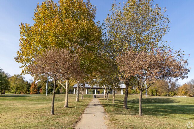 Residents can find peaceful, tree-lined walking paths at Carroll Park.