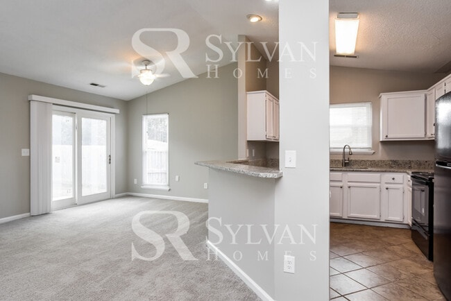 Photo - This home exudes a cheerful and welcoming charm!