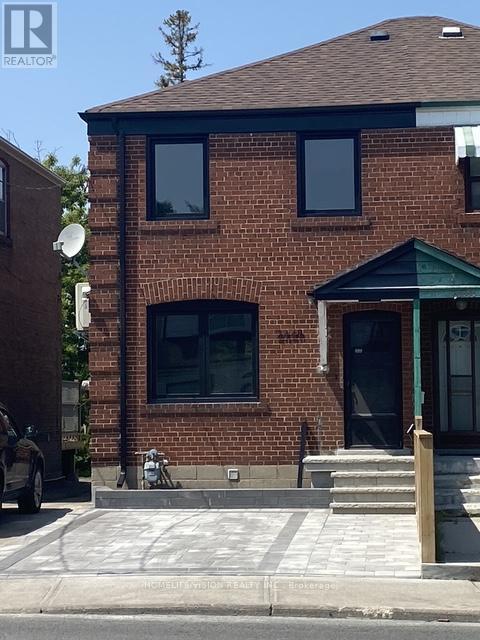 Building Photo - 2448 Gerrard St E