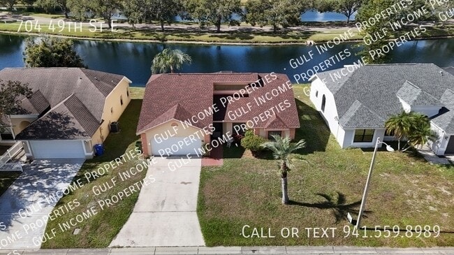 Photo - 704 49th St E House