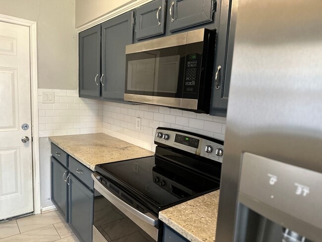 Building Photo - Take a look at this 4 bedroom 2 bath home