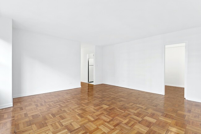 Building Photo - Large East 80th Street Doorman Studio.