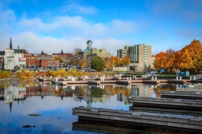 Brockville waterfront with autumn colours and reflections.
