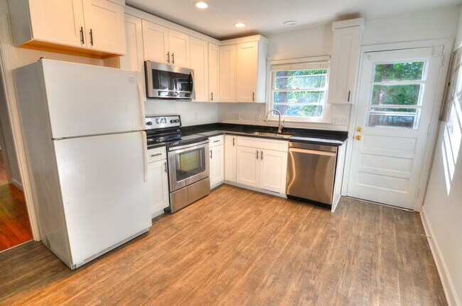 Building Photo - Charming Renovated 2 Bedroom Duplex in Car...