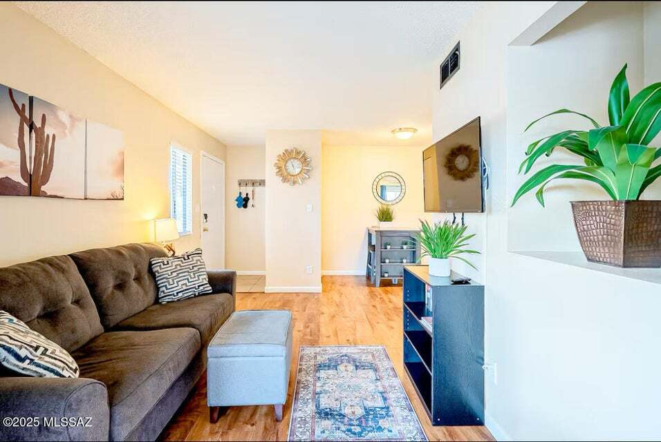 Nicely furnished living room. - 1745 E Glenn St