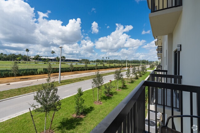 2BR, 2BA - 890SF - Balcony - Flamingo Village