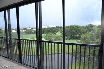 Building Photo - 7040 Pelican Bay Blvd