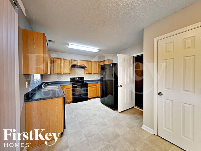 Foto del edificio - 6958 Mahonia Pl