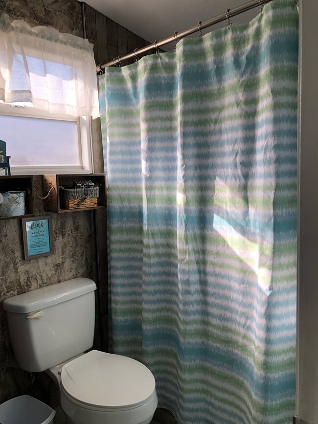 BATHROOM WITH SHOWERSTALL - 801 11th Ave W