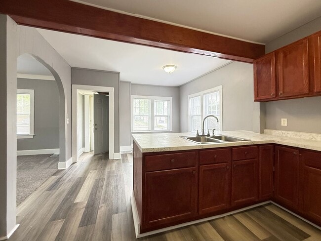 Building Photo - Spacious 2 Bed with Bonus Rooms & Fresh Updates