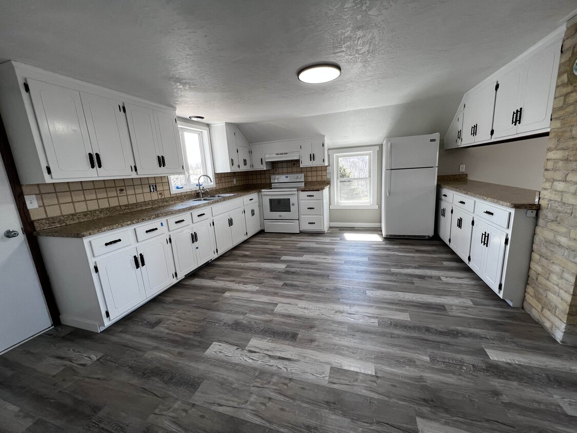 Large Kitchen with TONS of cabinets and counter space - 6290 Wildlife Dr