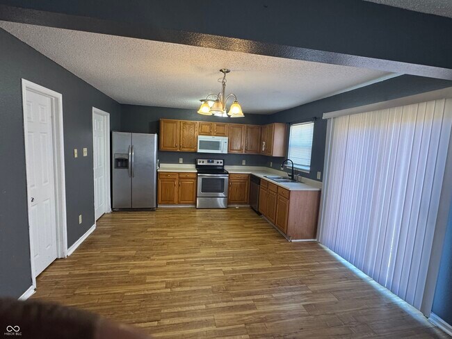 Foto del edificio - 9010 Orchid Bloom Pl