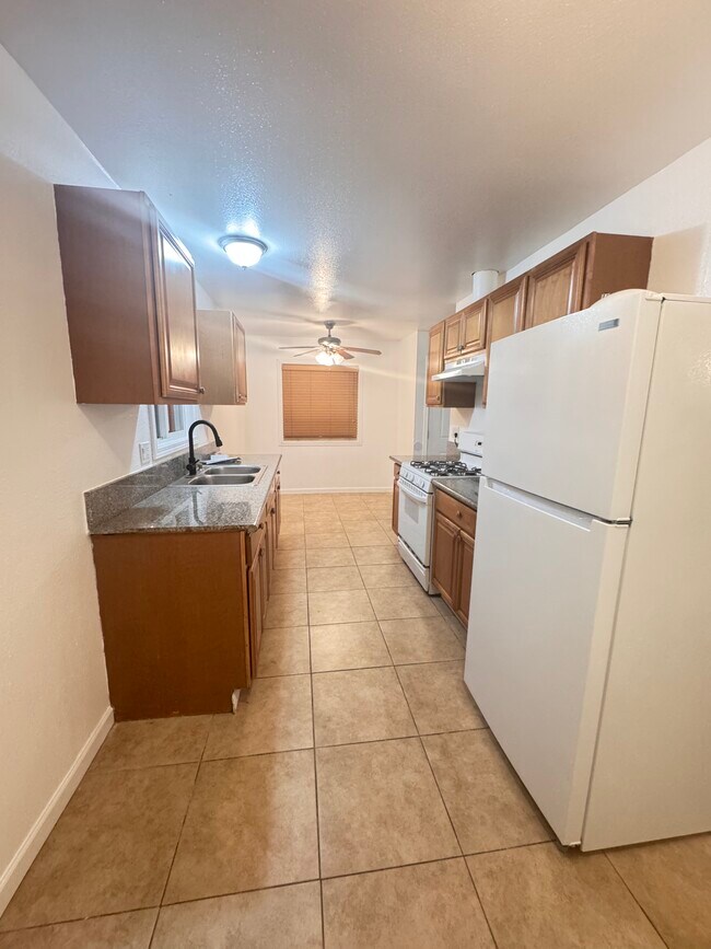 Kitchen Granite Counter + Tile Floor - 4245 Bonita Dr