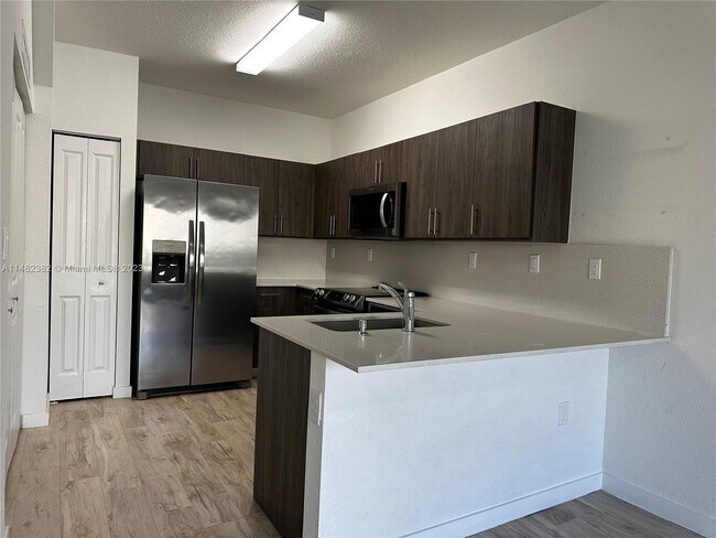 Building Photo - 15540 SW 136th St