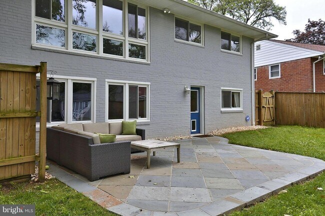 Back of the house -- entrance on the lower level - 6021 Berkshire Dr