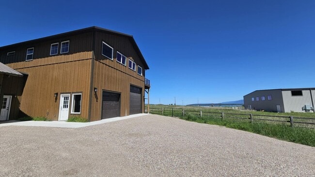 Building Photo - New unit above large shop!