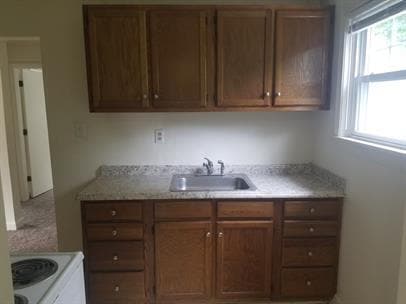 Building Photo - Available Now | Charming 2BR Apartment with Spacious Courtyard & Lawn Care Included