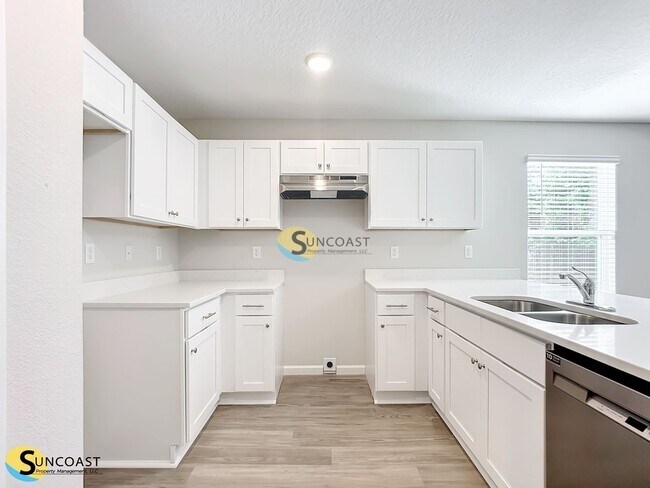 Foto del edificio - 6445 Breezy Oaks Wy