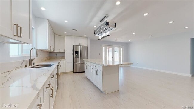 Building Photo - 4 br, 2 bath House - 7820 Lindley Ave