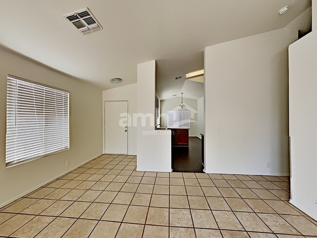 Building Photo - 10741 E Enid Ave