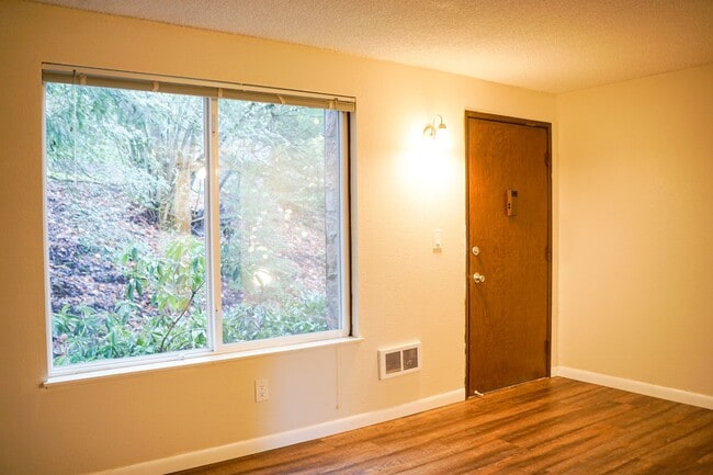 Photo - Spacious 1-Bed Surrounded by Tall Trees & Just Blocks from Popular Multnomah Village! Apartment