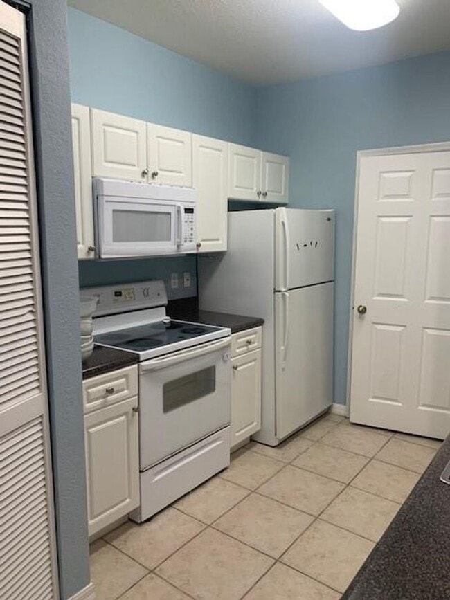 Building Photo - Palm Estates 2 Bedroom 2 Bath Condo w/Attached garage