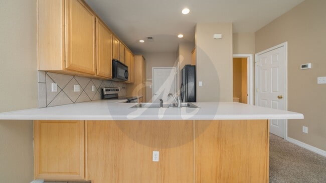 Foto del edificio - Spacious 3BR Townhome with 2-Car Garage & Private Covered Balcony