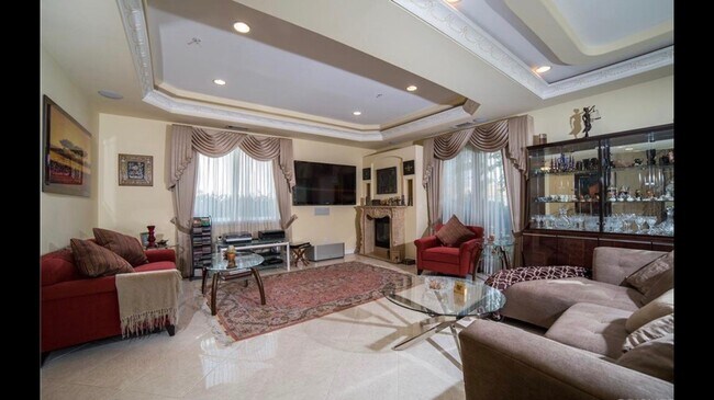 Living room & fireplace (furniture not included) - 727 E Cypress Ave