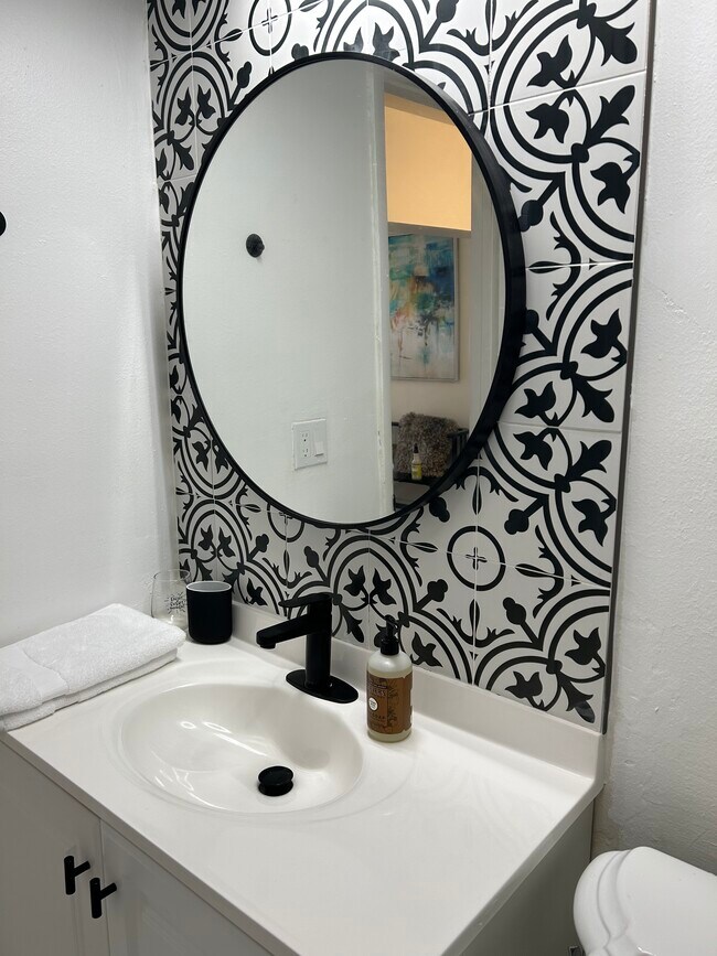 Bathroom sink and mirror - 4771 SW 7th St