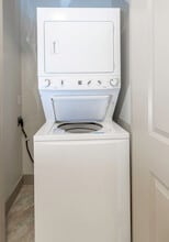 Stacked Washer Dryer - Dry Creek Apartments
