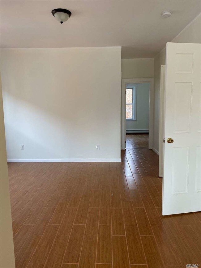 Building Photo - 64-44 83rd Pl