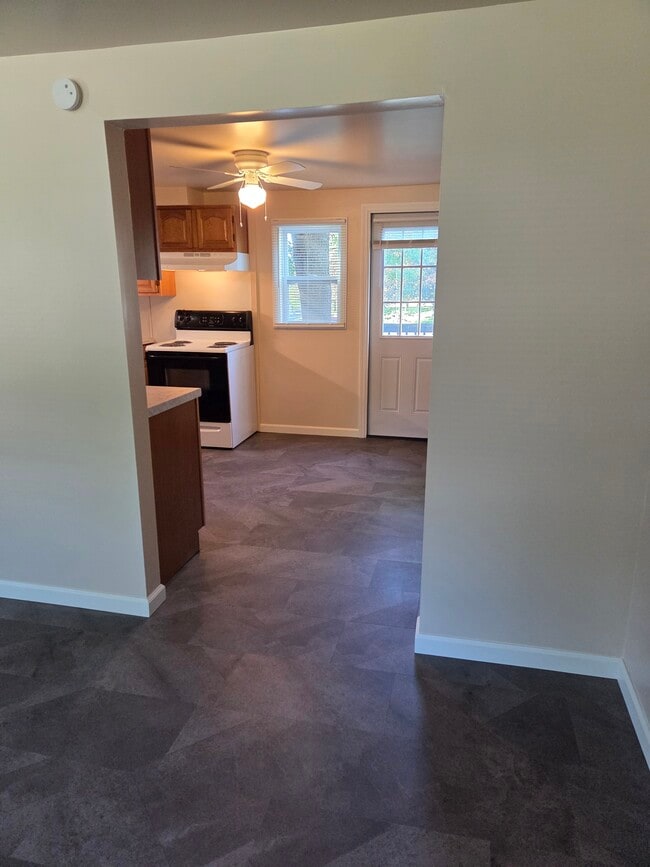 Eat in kitchen with new cabinets and counter tops. - 102 Stonecrest