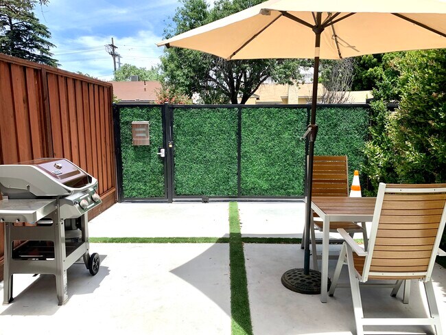 Outdoor BBQ and Dining Area. Chairs can adjust to Lounge. Total Privacy. Umbrella with Solar lights. - 5939 Vesper Ave