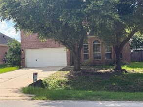 Building Photo - 9210 Hidden Lake E Dr