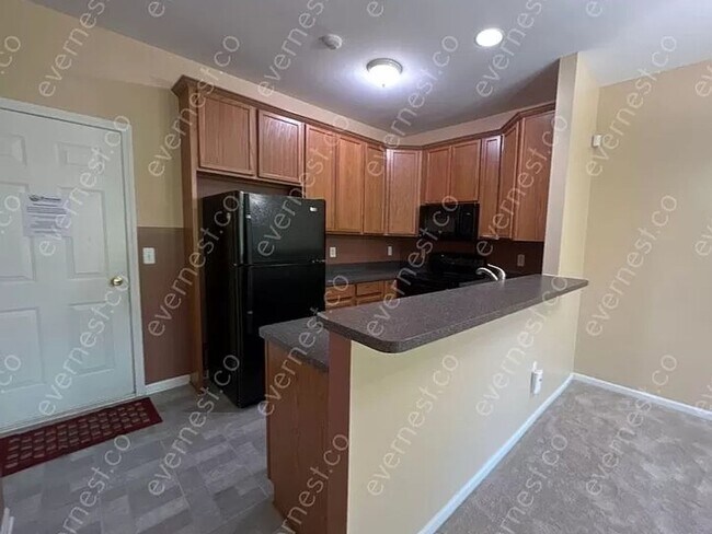 Foto del edificio - 2 Bedroom Condo with loft and basement in ...