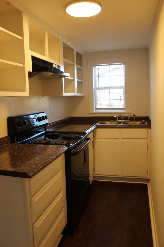 The kitchen has plenty of storage space. - 1309-C Jones Avenue