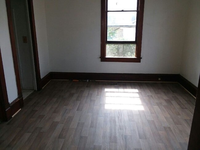 Building Photo - Corner lot with fenced yard!