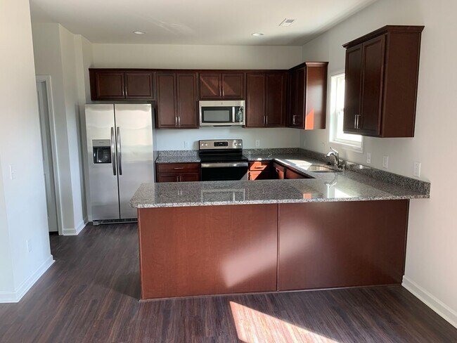 Building Photo - Four bedroom, 2.5 bath house in Elon, near...