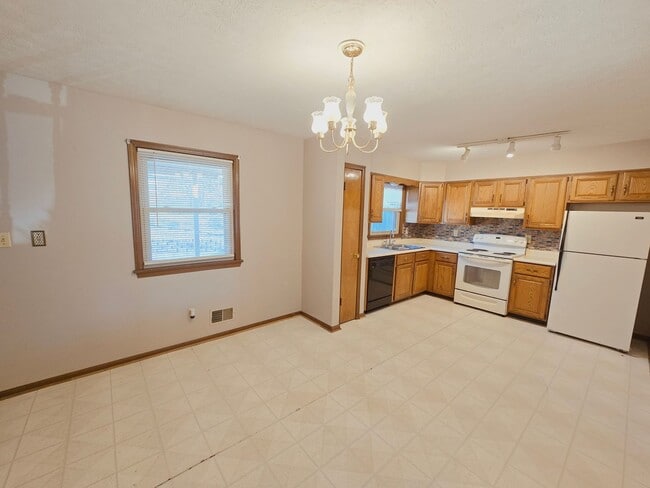 Photo - Spacious 3 Bedroom, 2.5 Bathroom Home with Garage, Carport & Basement