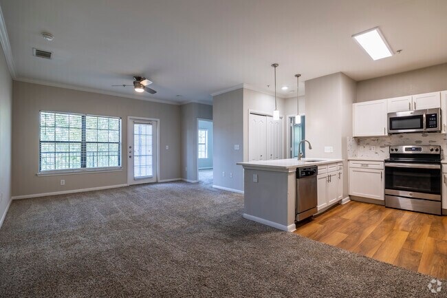 3BR/2BA, 1,263SF - Living Room/Kitchen - The JaXon