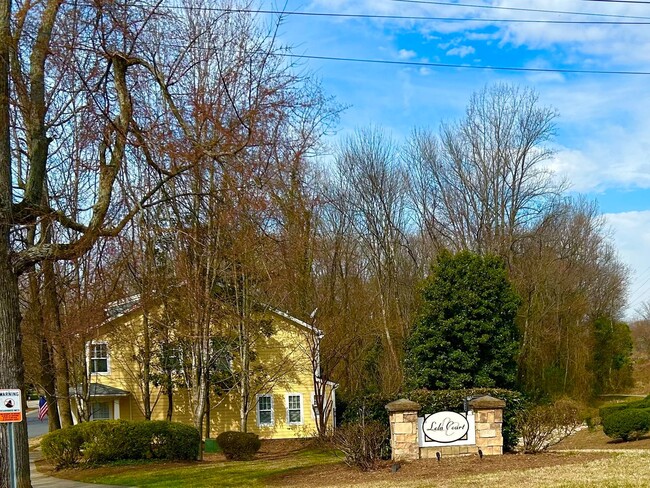 Building Photo - Move-in Ready Townhome in booming Wesley H...