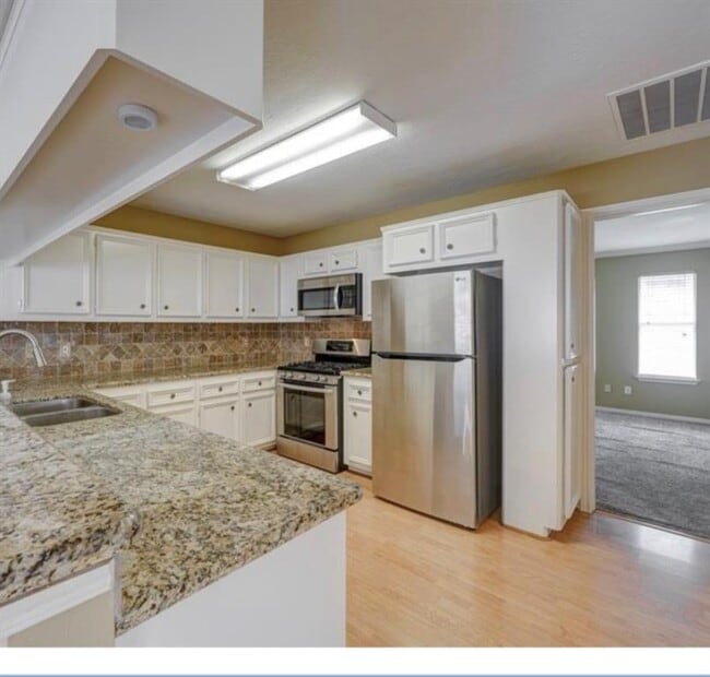 Building Photo - 7075 Gentle Breeze Dr