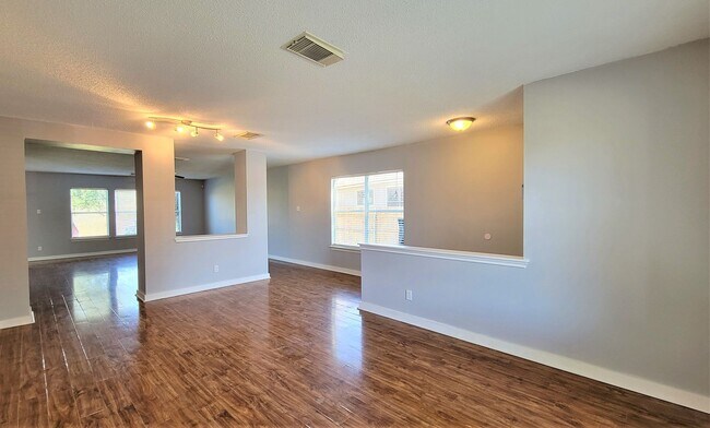Building Photo - This beautiful home features 5 bedrooms, 2...