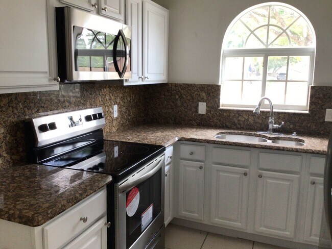 Foto del edificio - Magnolia Homes Town Home