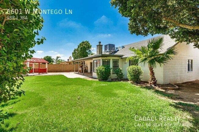 Building Photo - 4 bedroom 3 bathrooms 2 car garage, RV Gate