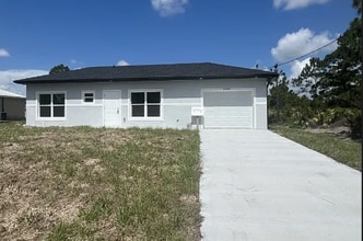 Building Photo - 1104 Capri St E