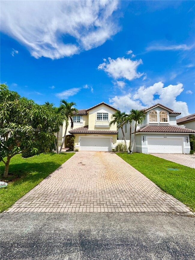 Building Photo - 5630 NW 104th Ct