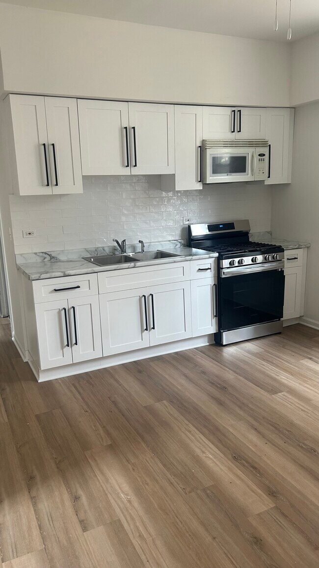 Foto del edificio - 3219 W 23rd St