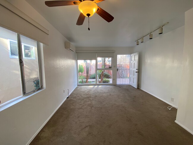 Living room with lots of light and front door - 1976 Missouri St